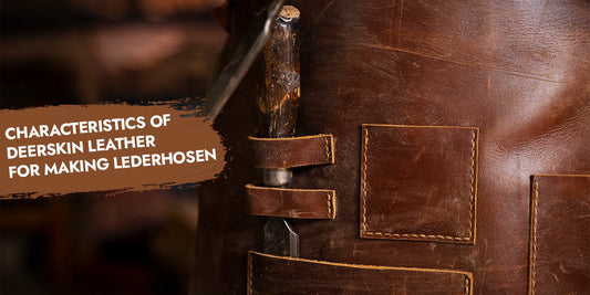 Close-up of premium deerskin leather with handcrafted stitching and leatherworking tools, highlighting the quality and durability of authentic Bavarian lederhosen