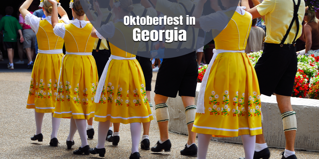 Festival performers dancing in traditional Bavarian clothing during Oktoberfest in Georgia, showcasing authentic German folk culture and festive celebrations
