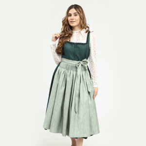 Green dirndl dress featuring a fitted bodice, wide gathered skirt, and contrasting pale green apron with waist tie