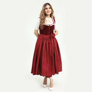 Classic red sleeveless dirndl dress featuring a fitted bodice with button detail, contrasting trim at the neckline, and a wide skirt cinched with a sash bow