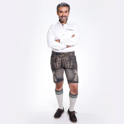 Brown suede lederhosen with cream floral embroidery, decorative side buttons and embossed deer buckle belt