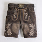 Brown suede lederhosen with cream floral embroidery, decorative side buttons and embossed deer buckle belt