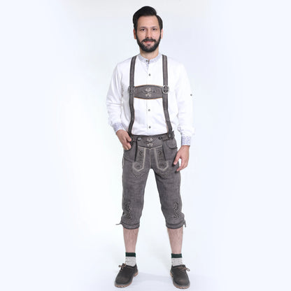 Gray suede bundhosen with decorative embroidery, front flap closure, side pockets, and adjustable leg ties