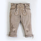 Gray suede bundhosen with embossed detailing, front flap panel, side pocket, and deer motif accents on the legs