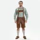 Brown suede lederhosen with white embroidered detailing, decorative metal buttons and contrast piping accents