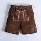 Brown women lederhosen with cream piping, floral embroidery, decorative front flap, and metal button accents